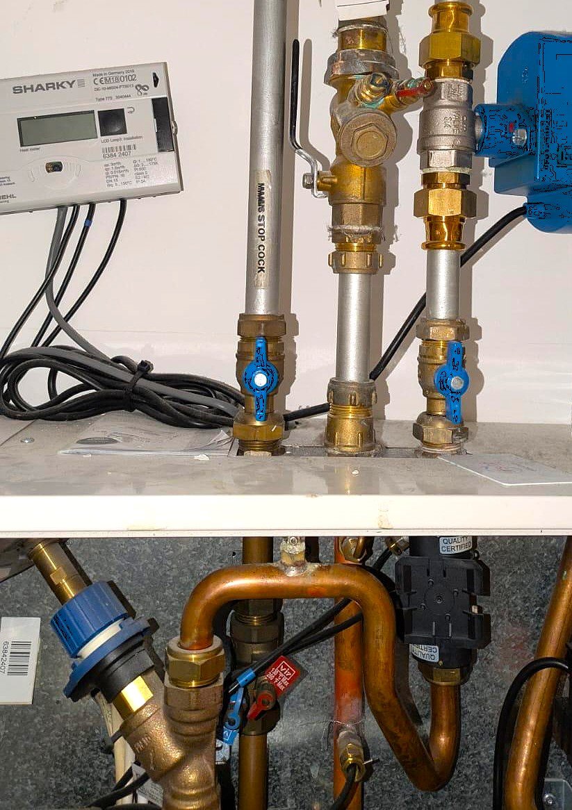 HIU water pipe connections and isolation valves installed in London building